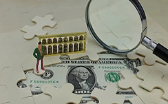 美元指数反弹叠加避险情绪减弱，黄金维持高位震荡